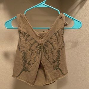 army green cropped shirt with a butterfly.